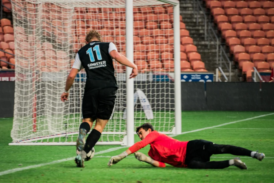 Fire FC attacks the goal in the State Cup final.