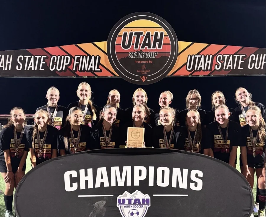 Fire FC girls celebrate their State Cup championship.